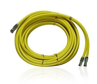 Coiled yellow network cable with metal connectors at both ends