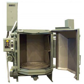 Open industrial oven with hinged door, control panel, and stainless steel chamber.