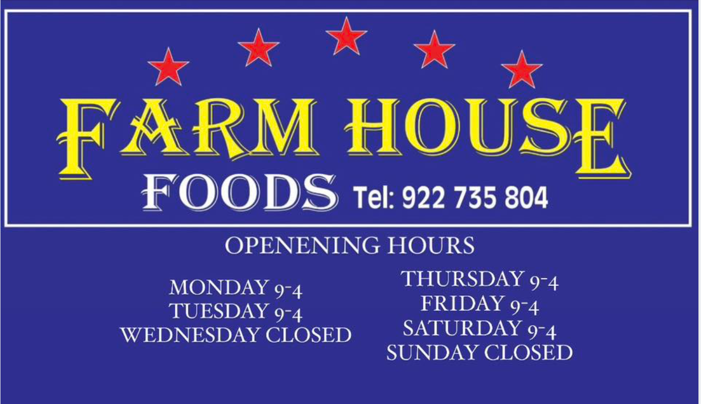 A blue sign that says farm house foods on it