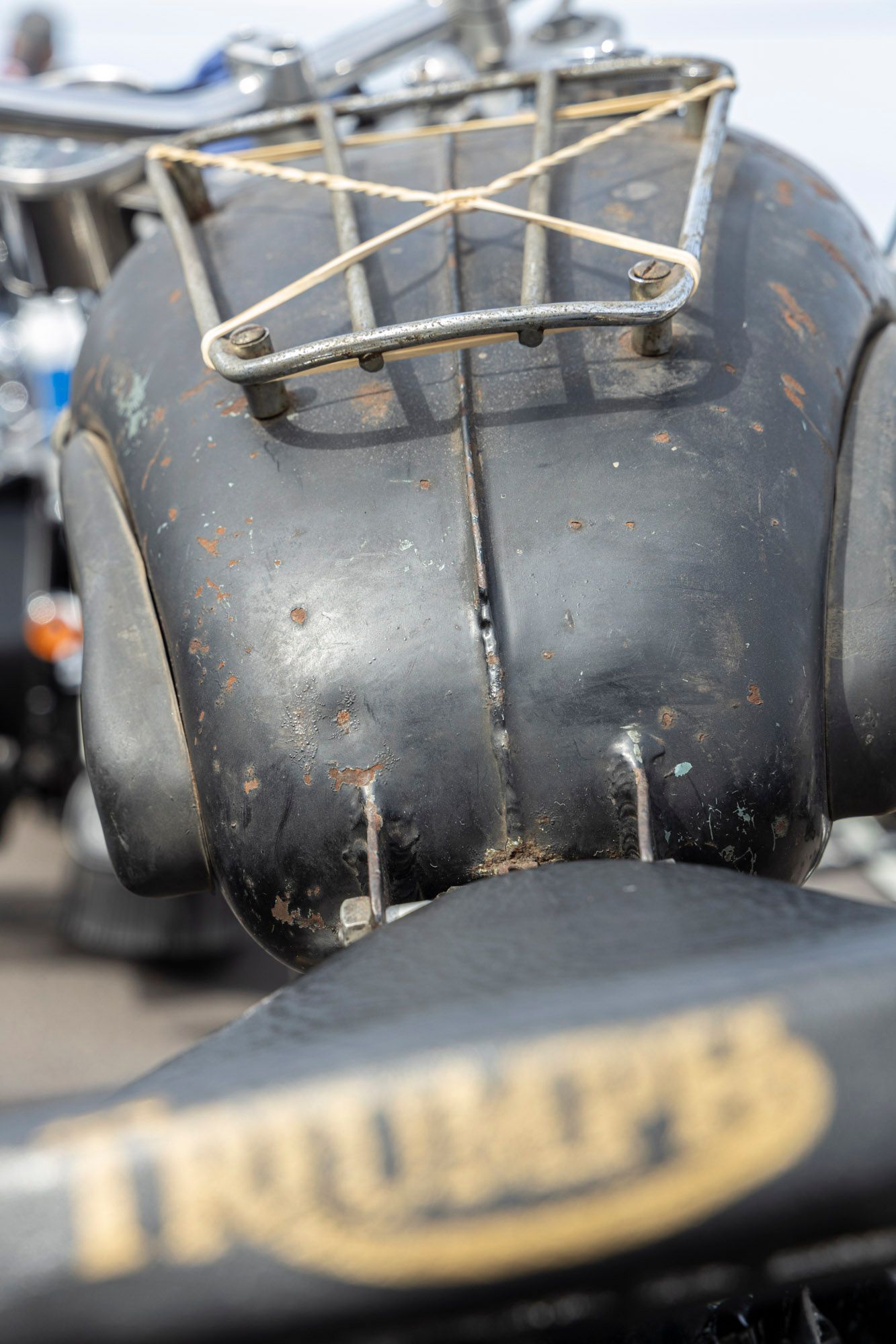 A close up of the back of a triumph motorcycle