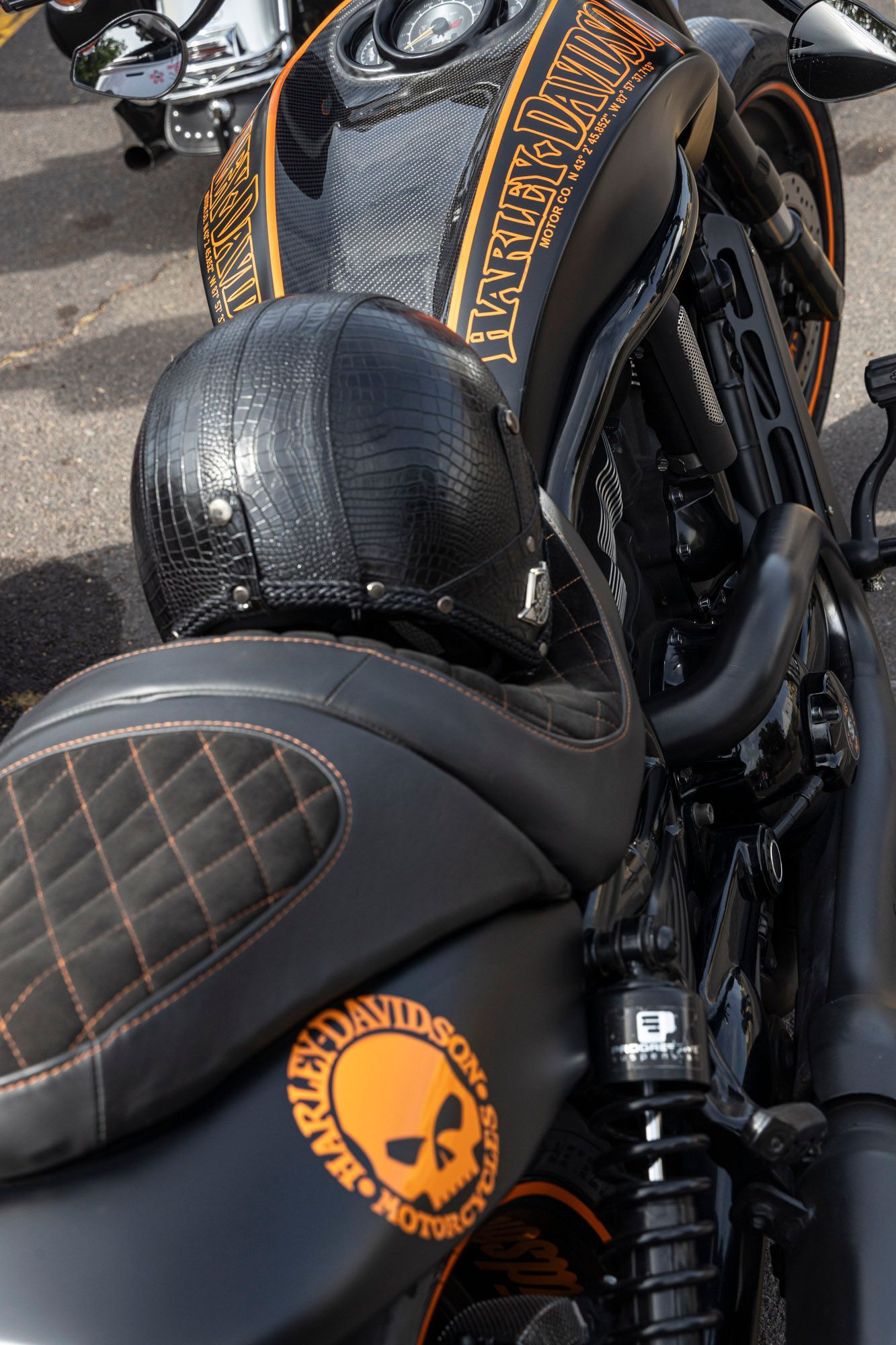A harley davidson motorcycle with a helmet on it