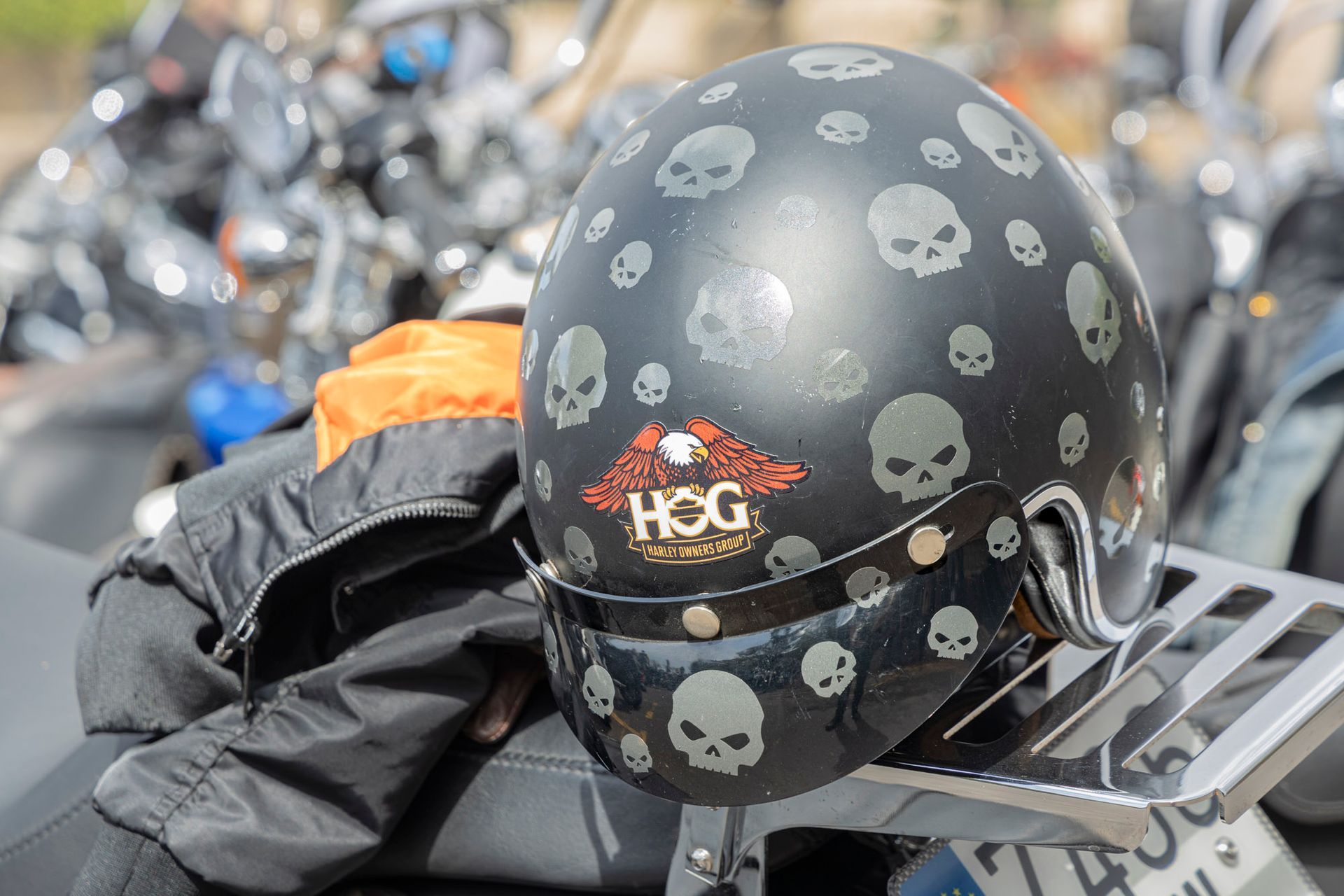A black helmet with skulls and the word hog on it