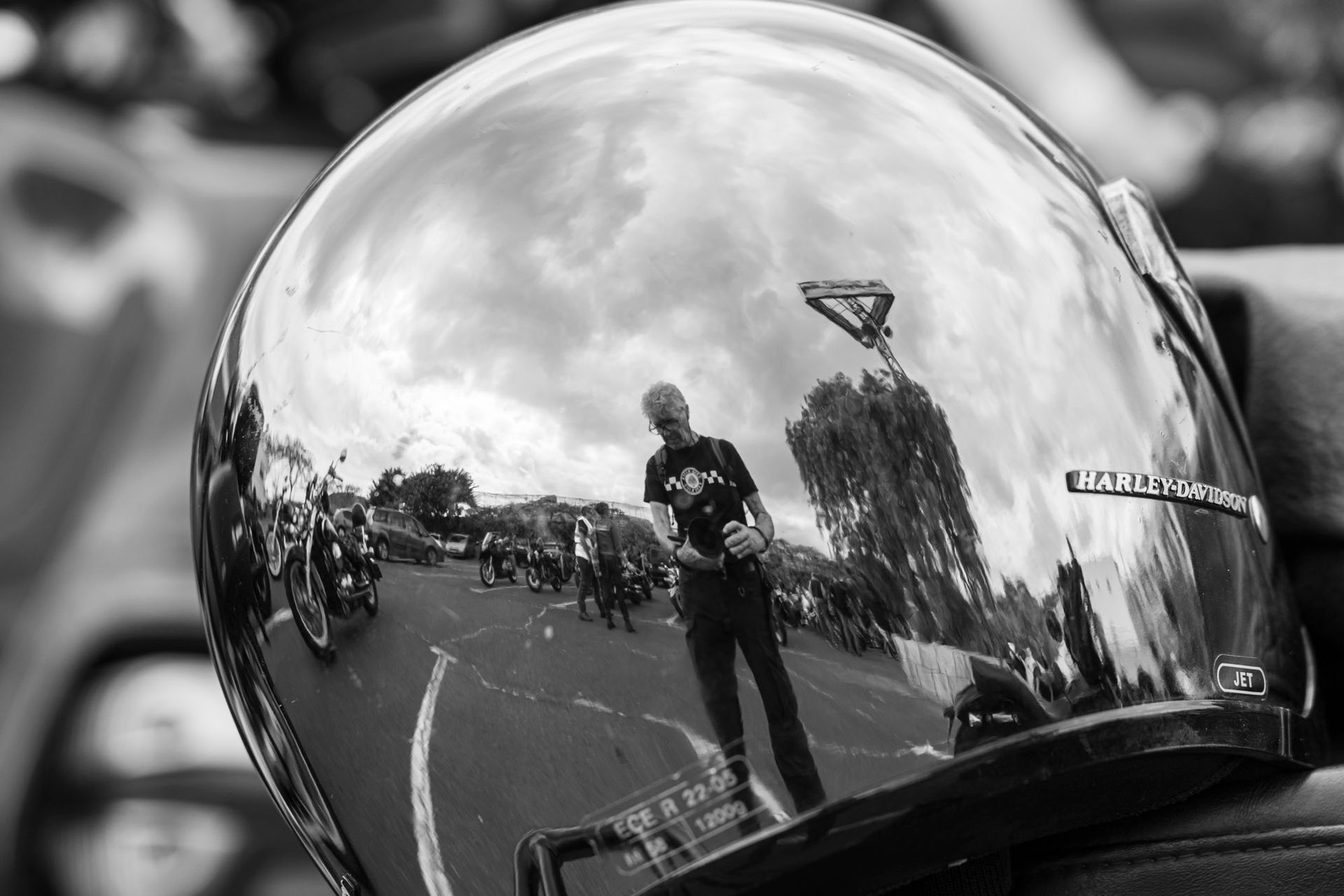 A black and white photo of a harley davidson helmet