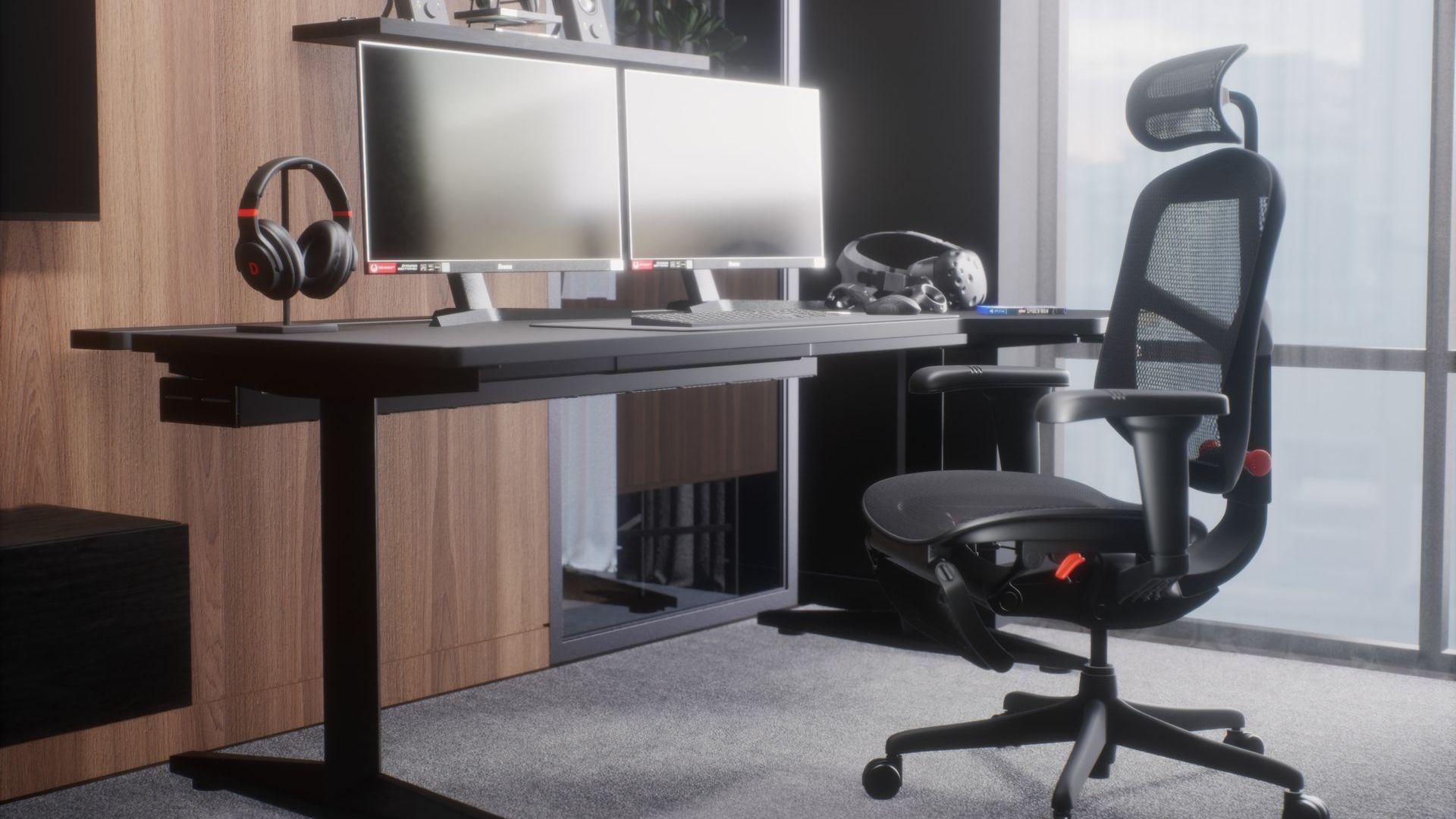 Black ergonomic gaming chair with mesh upholstery, including a headrest and legrest. The chair is situated at a gaming desk with two large monitors, headphones, and a VR headset. The room has a grey carpet and a wooden wall.