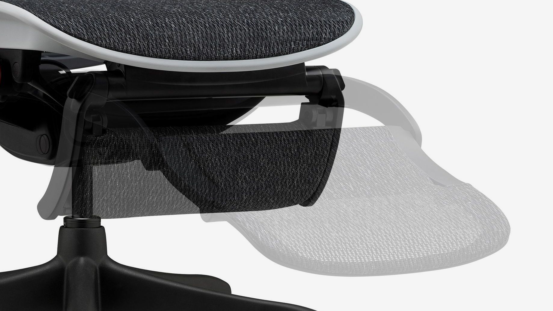 Close up of the bottom of the Ergohuman chair with a grey frame and black mesh. The legrest is down but there is a faded image over top to show the legrest elevated.