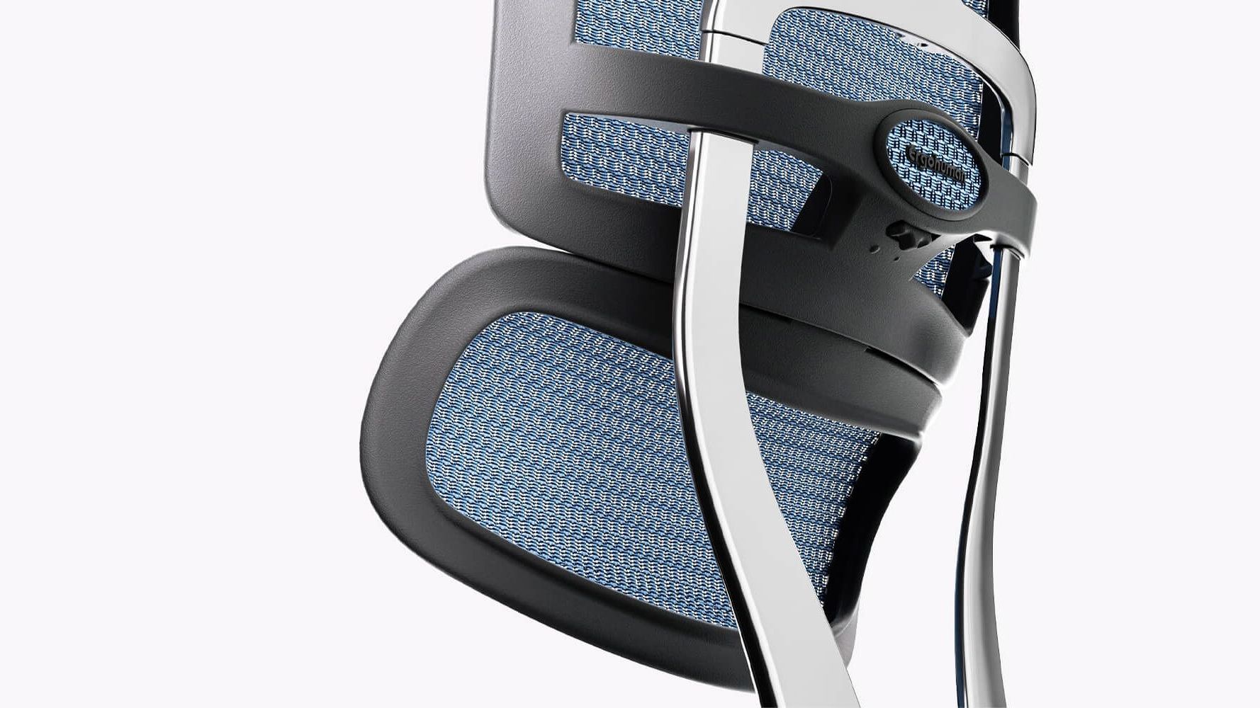 Close up of a black Ergohuman chair with cobalt mesh. This photo features the back of the chair