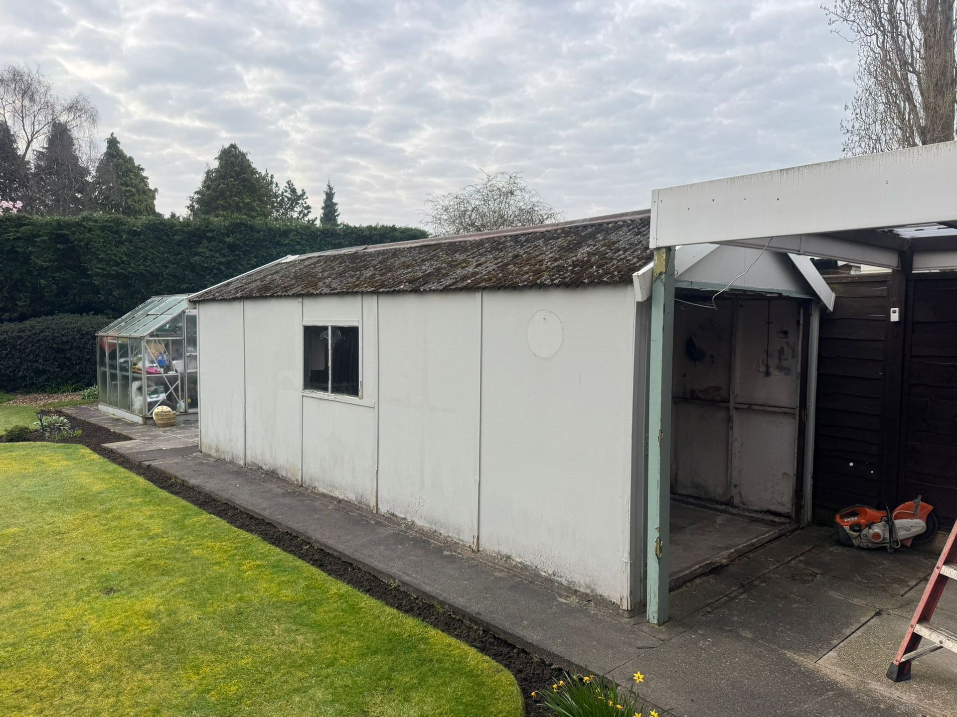White old asbestos garage
