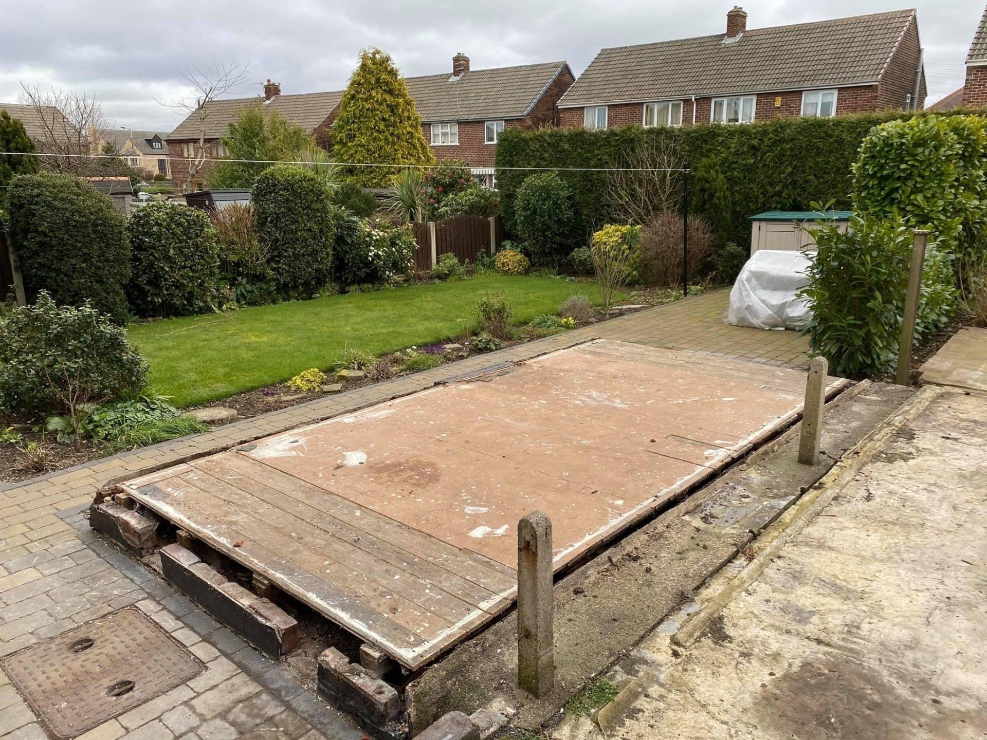 Roof removed from brick garage