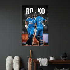 Two cricket players in blue uniforms celebrate under the word “RO KO,” with gear displayed below.
