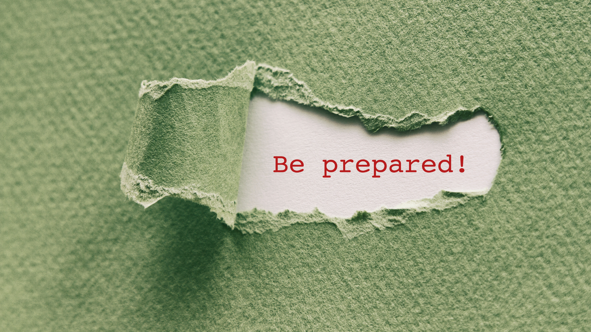 A piece of torn paper with the words be prepared written on it