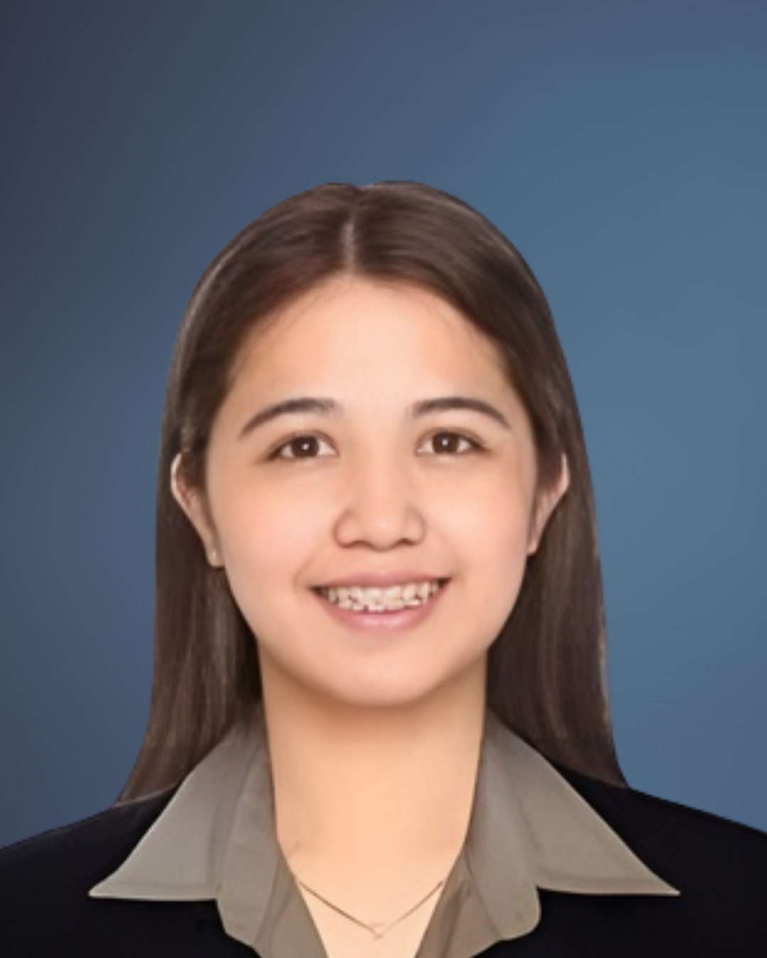 A woman in a suit and collared shirt is smiling for the camera.