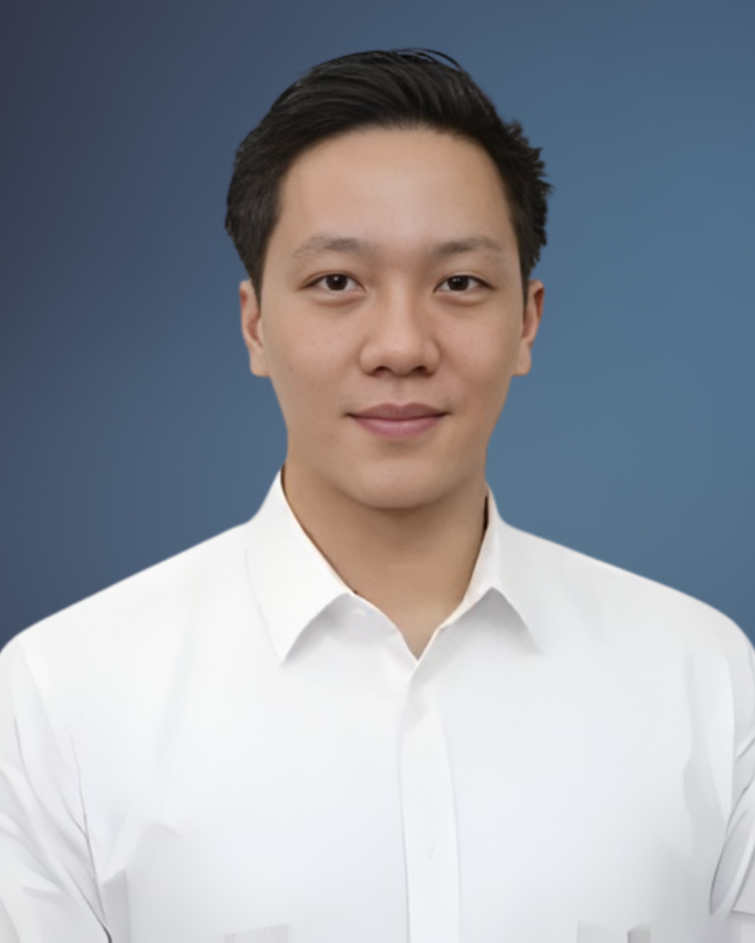 A man in a suit and tie is smiling for the camera
