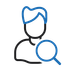 A man is looking through a magnifying glass.