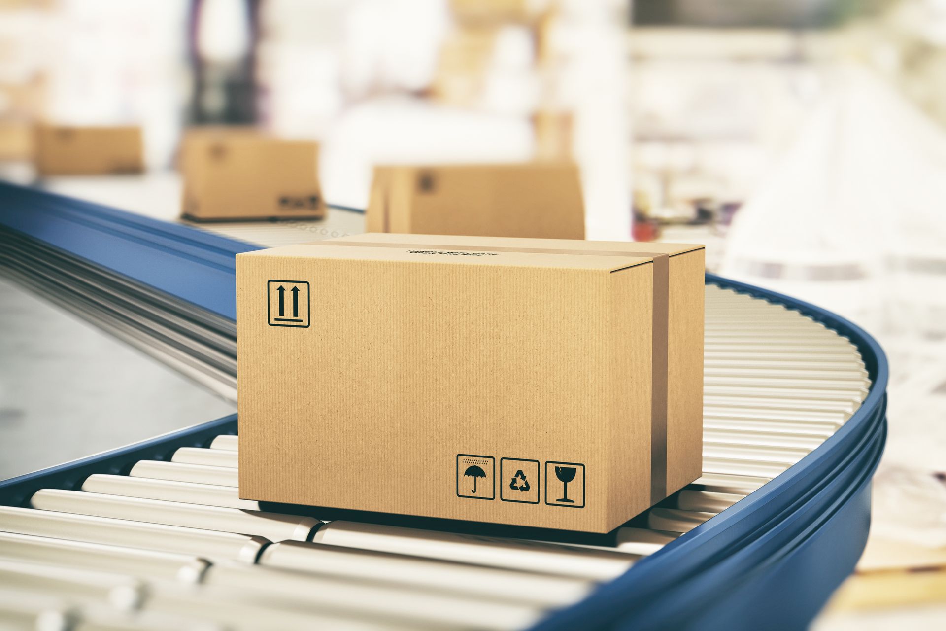Cardboard box on a conveyor belt, ready for shipping. Industrial setting.