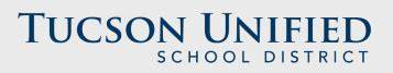 Tucson Unified School District logo in dark blue text on a light background.