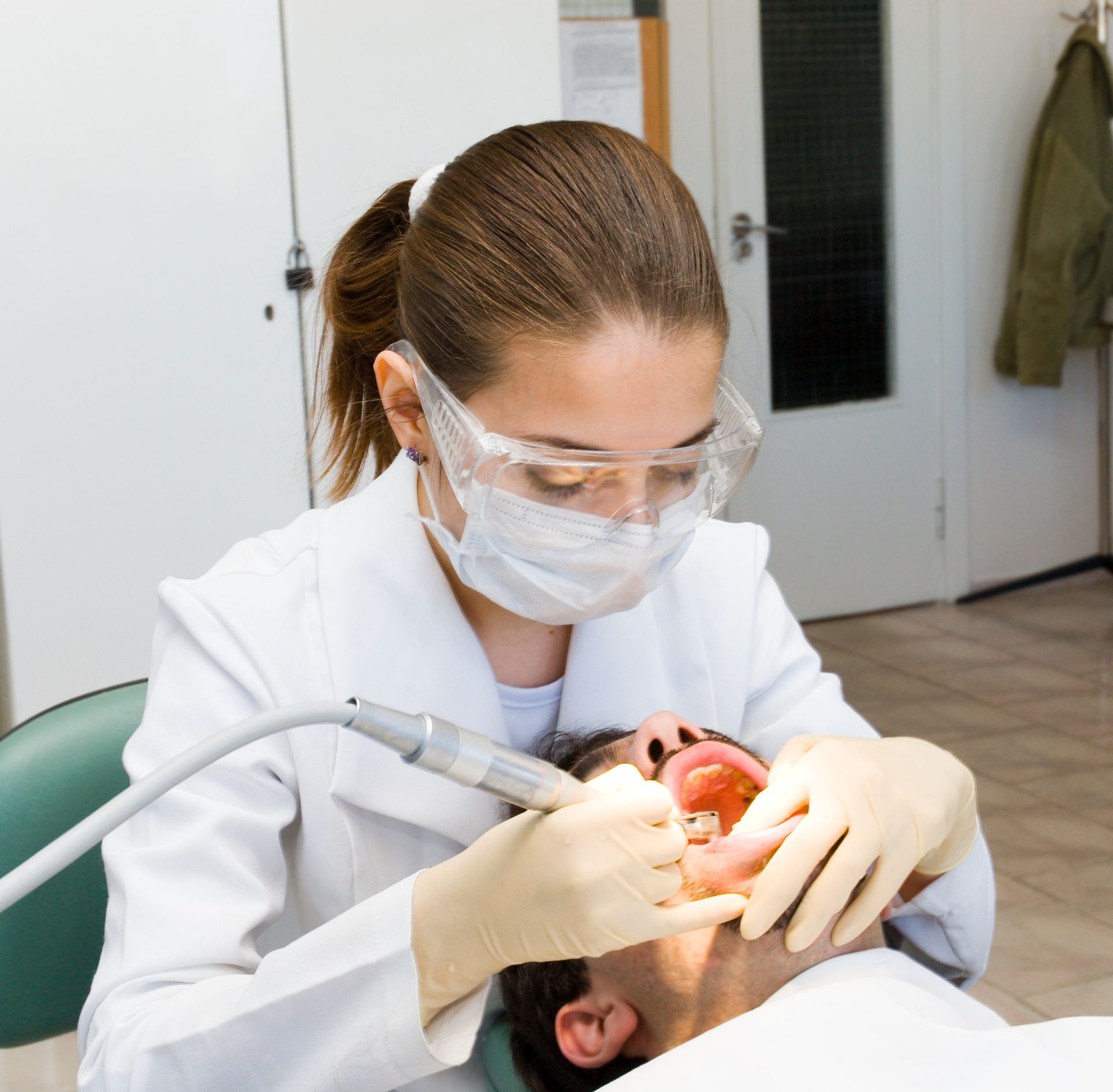 Dentists at Sumter Family Dental Center in Sumter, SC, checking a patient's dental crowns Dentists at Sumter Family Dental Center in Sumter, SC, checking a patient's dental crowns
