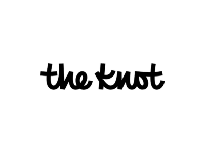 Black handwritten “the knot” logo on a white background