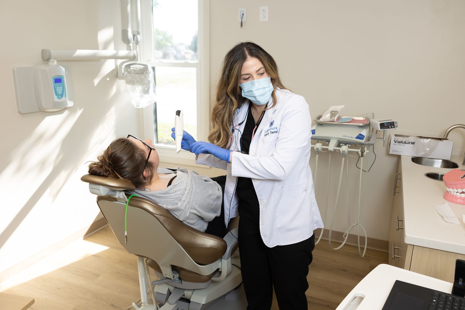Treating a patient on a dentist chair in Willoughby
