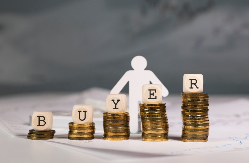A stack of coins with the word buyer written on them