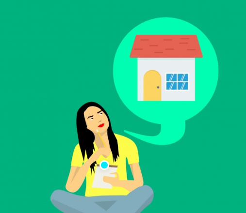 A woman is sitting on the floor thinking about buying a house.
