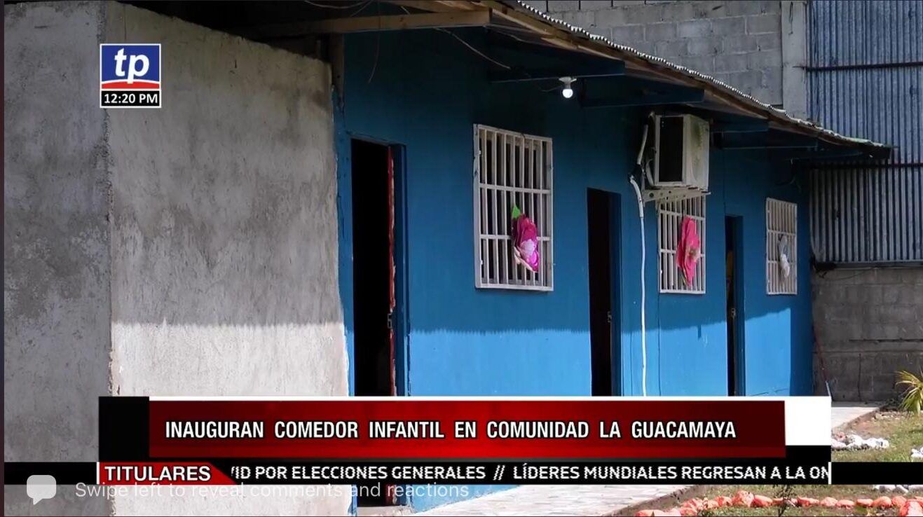 Blue house with barred windows and a red news ticker overlay at the bottom.