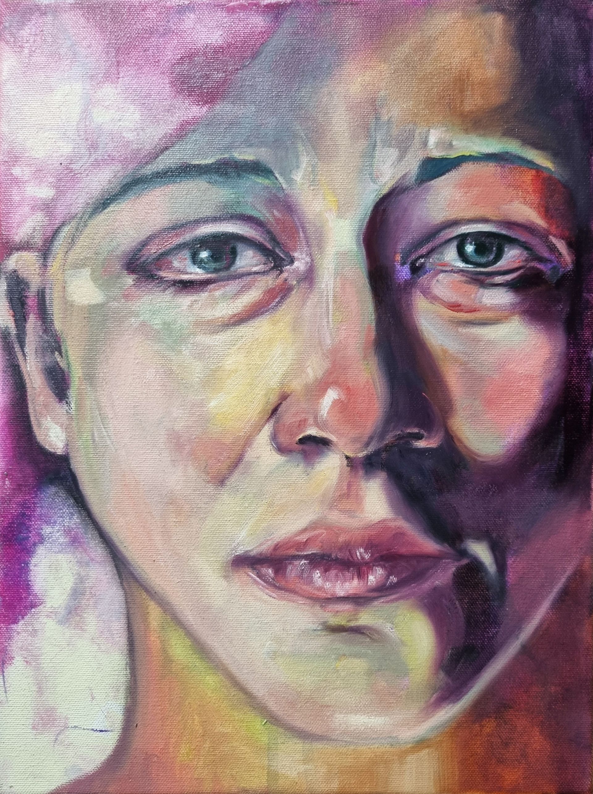 A close up of a woman 's face in a colorful painting.
