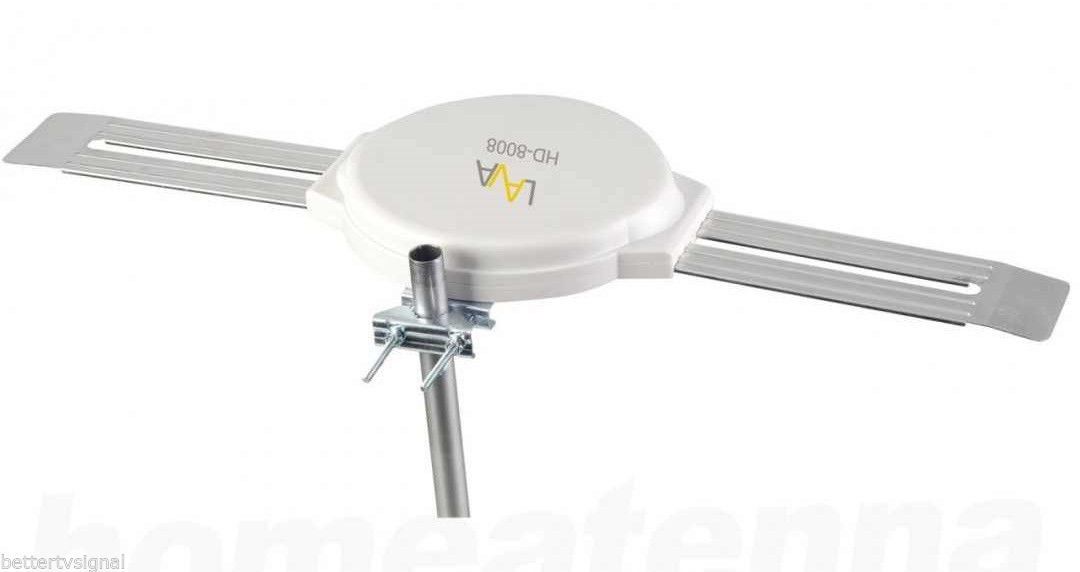 A white antenna is sitting on top of a metal pole.