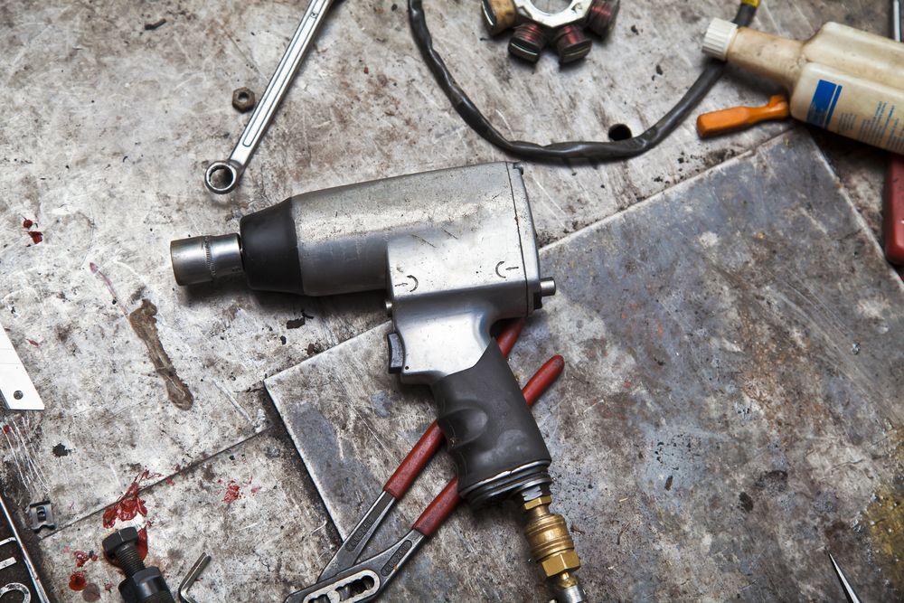 Impact Wrench on a Cluttered Metal — Cairns Electrical Rewinds & Repairs In Cairns, QLD