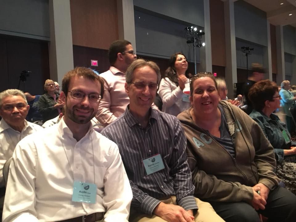 Three People Smiling at A Conference — Amherst, MA — Immanuel Lutheran Church Three People Smiling at A Conference — Amherst, MA — Immanuel Lutheran Church