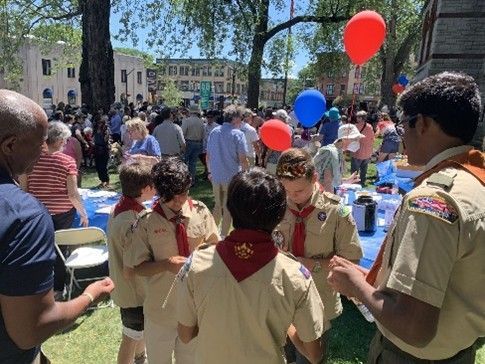 Scouts in Uniform at An Outdoor Event with A Crowd — Amherst, MA — Immanuel Lutheran Church