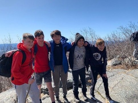 Five People with Arms Around Each Other — Amherst, MA — Immanuel Lutheran Church