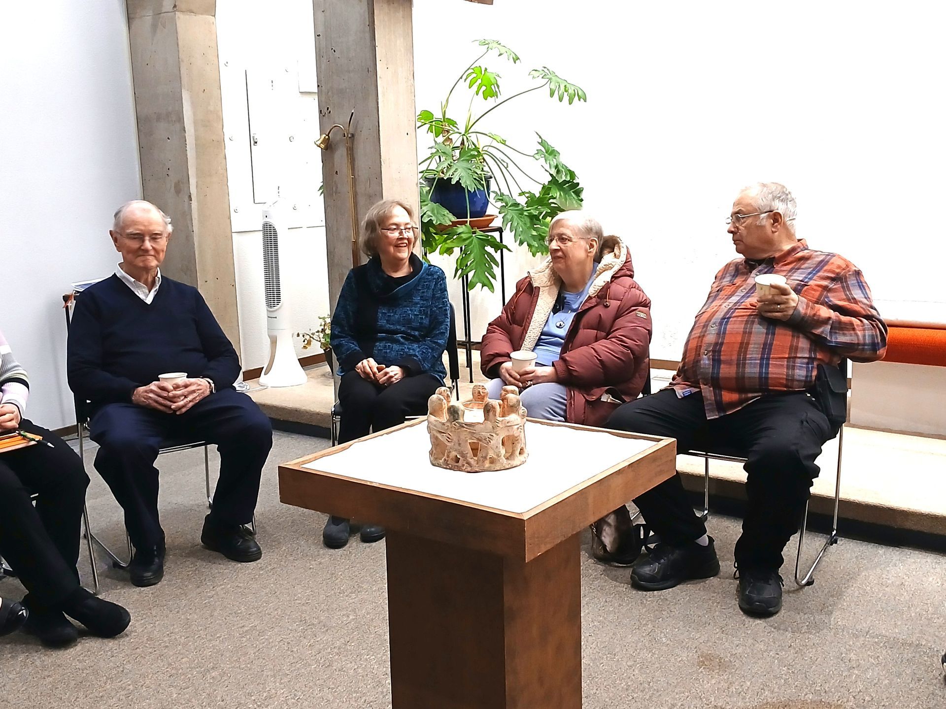 Group of People Seated Around a Table — Amherst, MA — Immanuel Lutheran Church