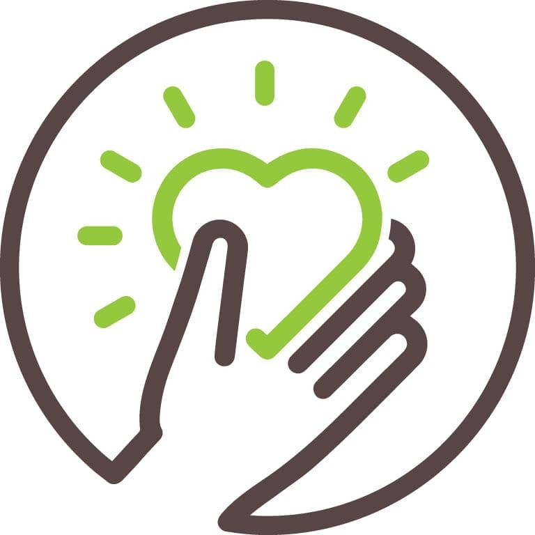 A hand is holding a heart in a circle.