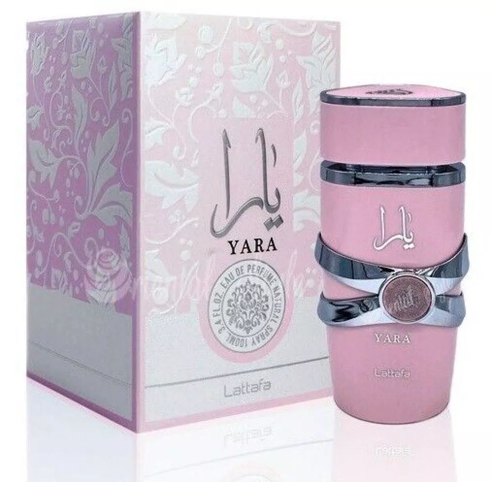 Flacone di profumo rosa Yara Lattafa e scatola coordinata con dettagli argentati.