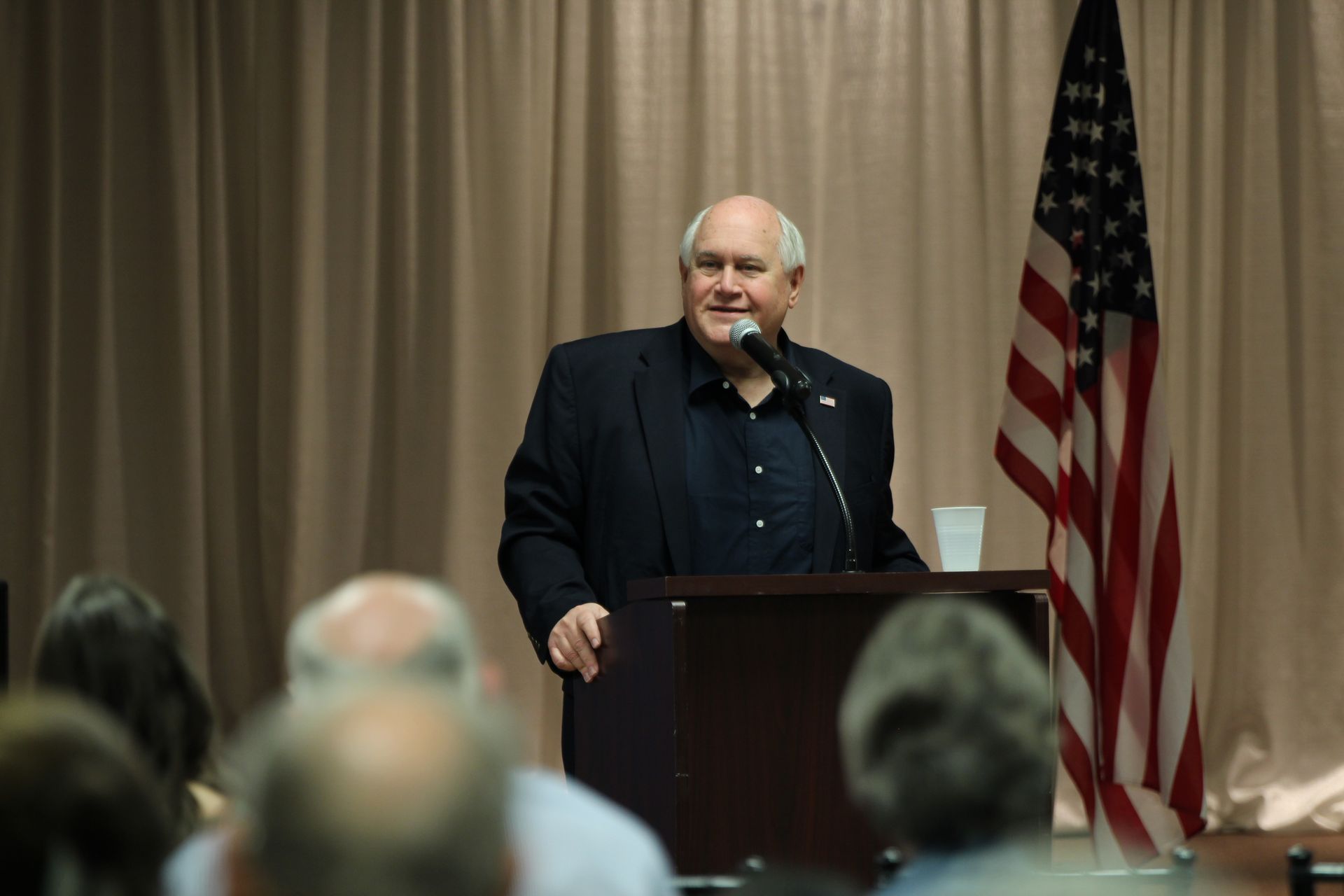 Ron Estes at the podium