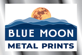 Blue Moon Metal Prints logo with blue mountains and an orange moon over a white background