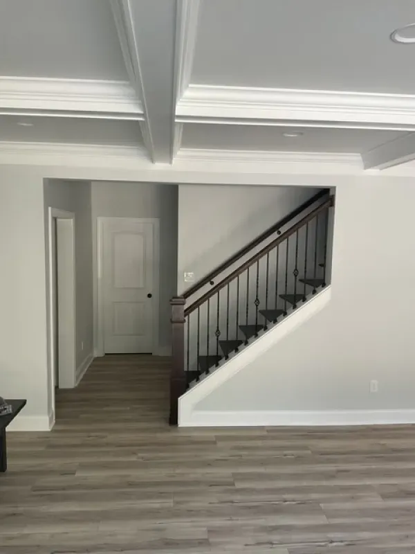 There is a staircase in the middle of the room.