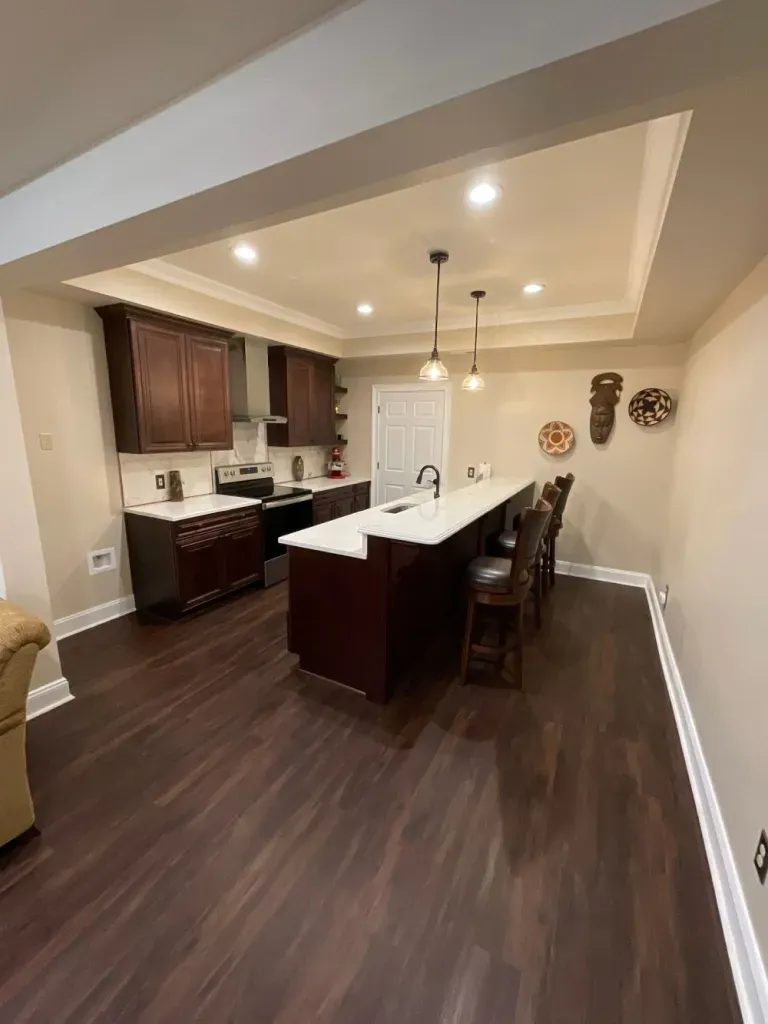 A kitchen with a large island in the middle of the room.