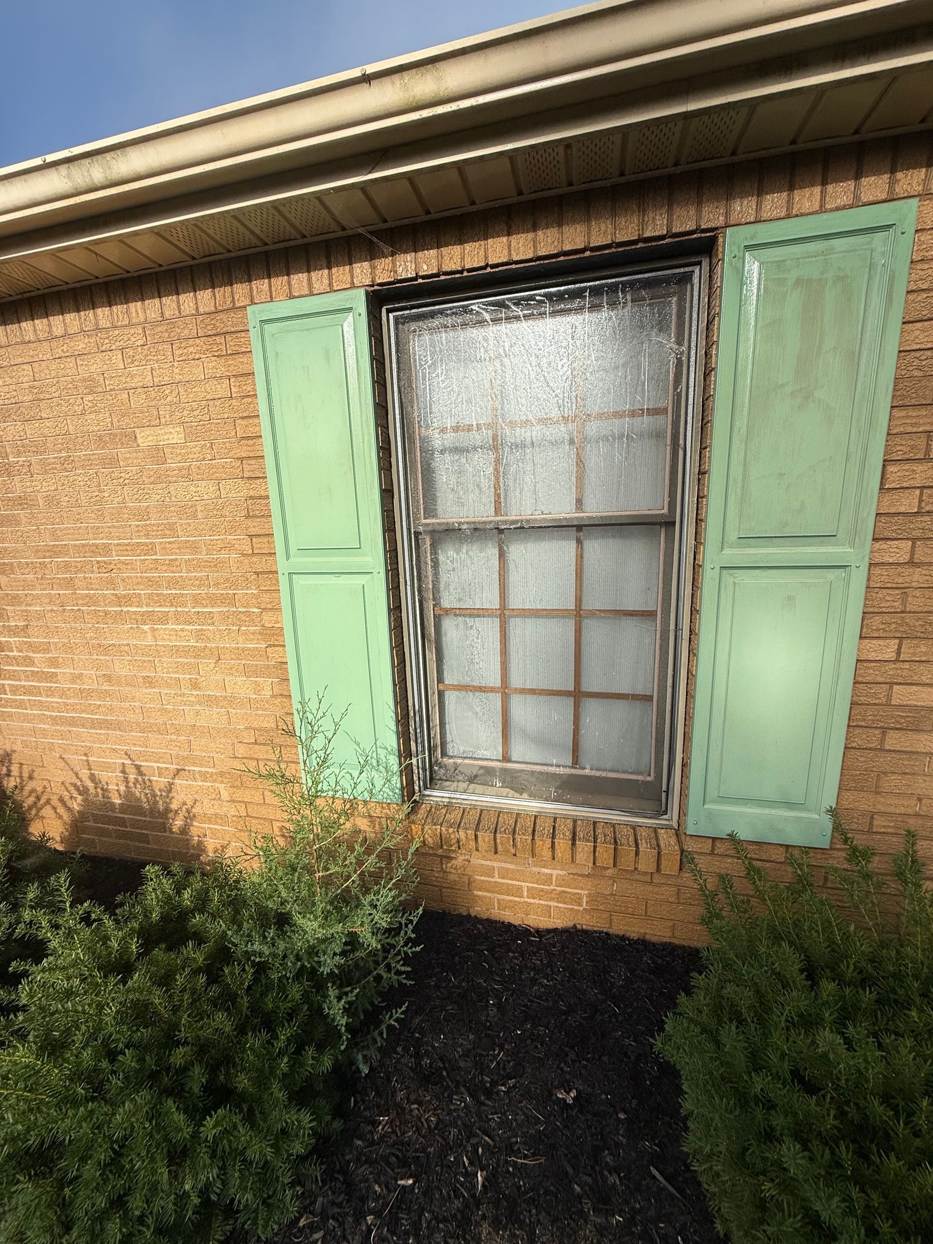 Before exterior shutter painting by Whaleys Painting and More in Sevierville.TN
