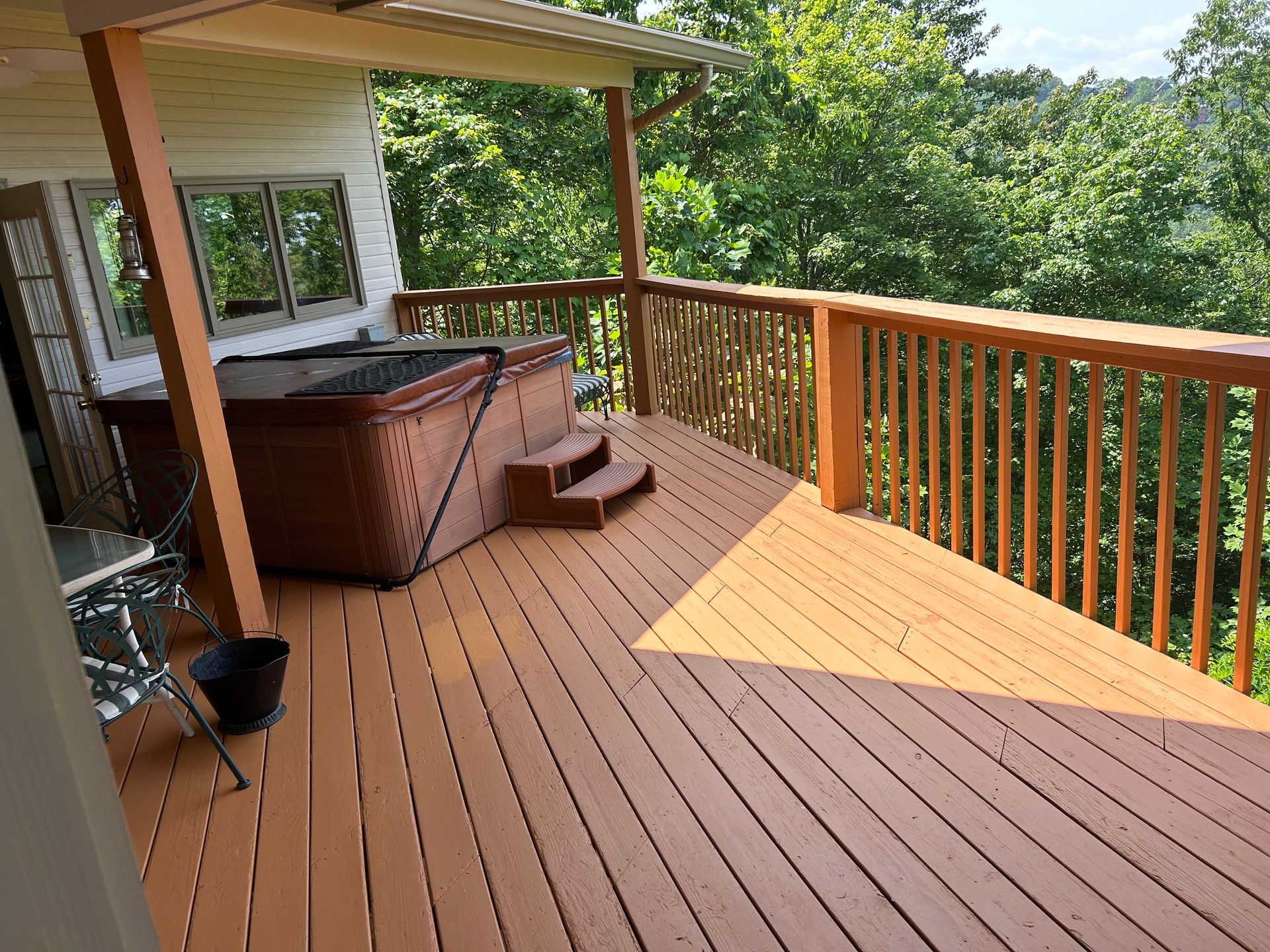 Deck staining for a cabin rental by Whaleys Painting and More in Gatlinburg,TN