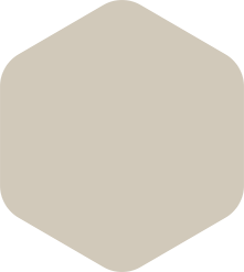 Rounded-corner, pale taupe hexagon.
