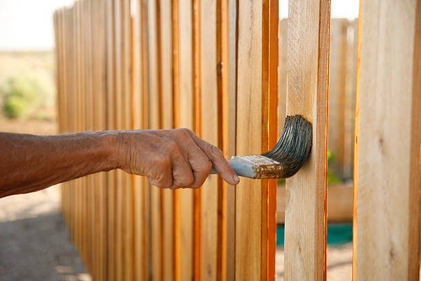 Wood fence sealing and staining