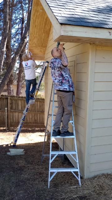 Caulking and prep work on a shed before painting by Whaleys Painting and More in Knoxville,TN