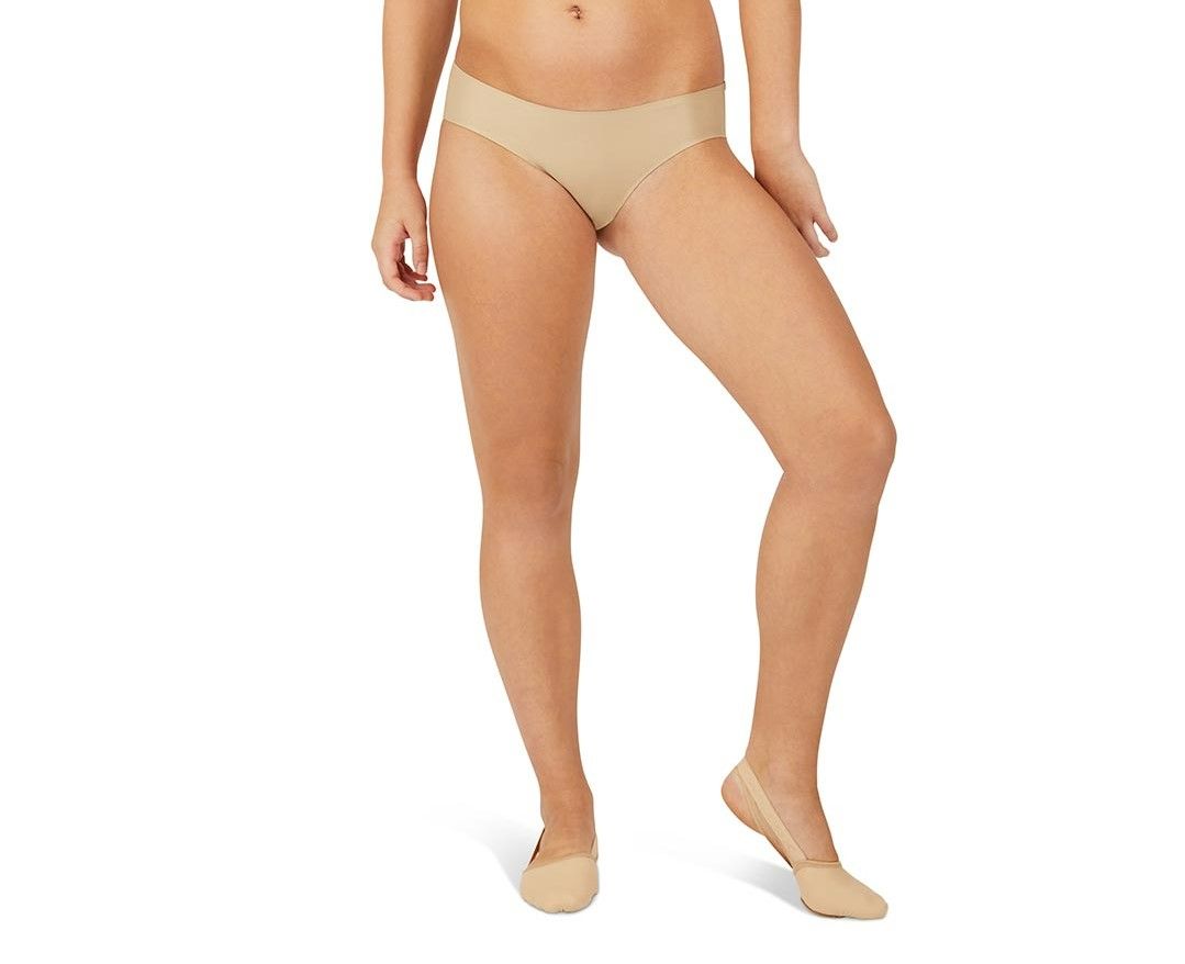A woman is wearing a pair of tan thongs and socks.