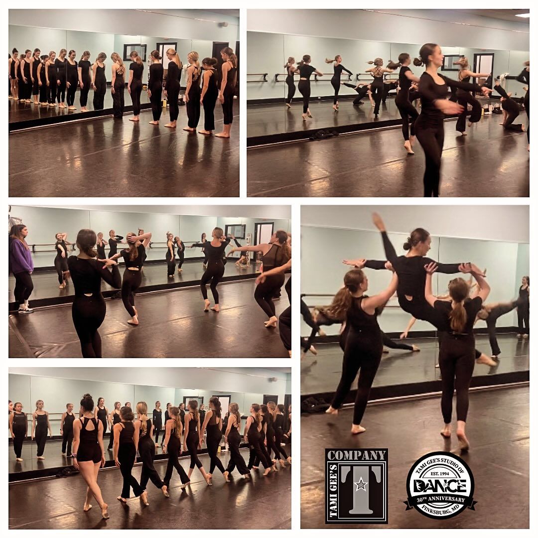A group of people are dancing in a dance studio.