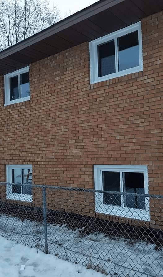 Home Exterior With Sliding Windows