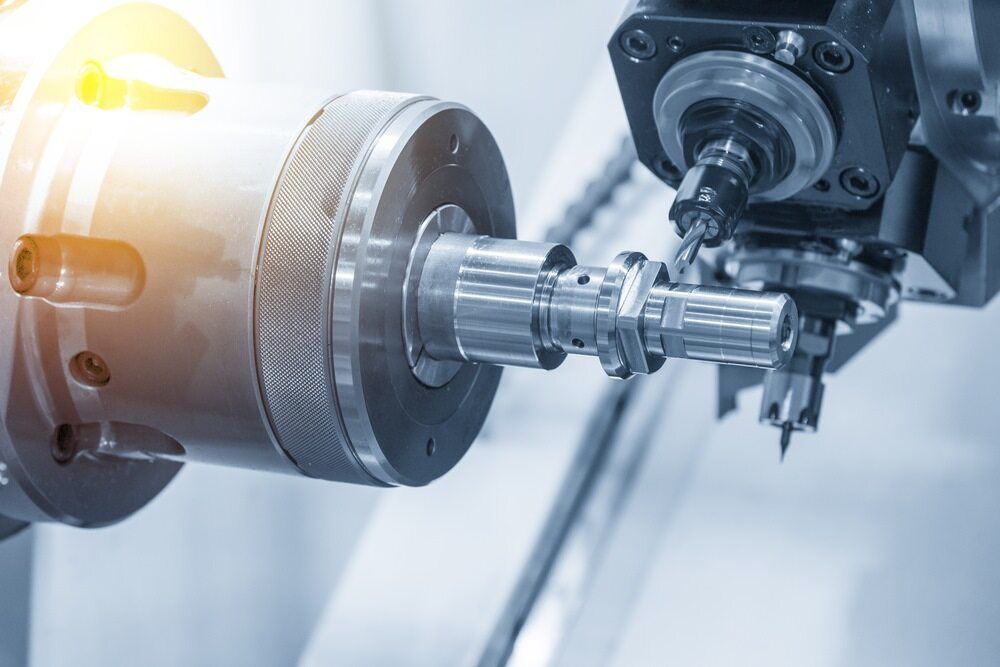 A Machine Is Cutting A Piece Of Metal In A Factory — Summerland Tool Supplies In Casino, NSW