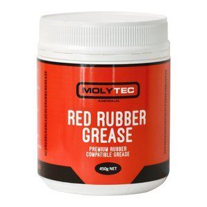 A Jar of Red Rubber Grease is Sitting on a White Surface — Summerland Tool Supplies in Casino, NSW