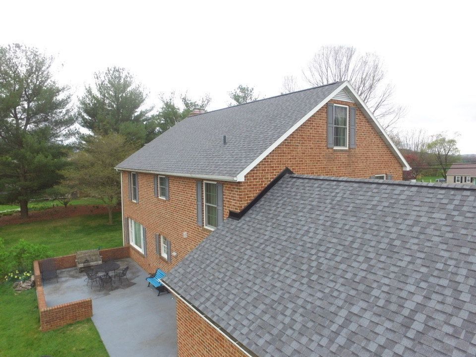 Brick House Two Windows - Williamsport, MD - Poffenberger Roofing 