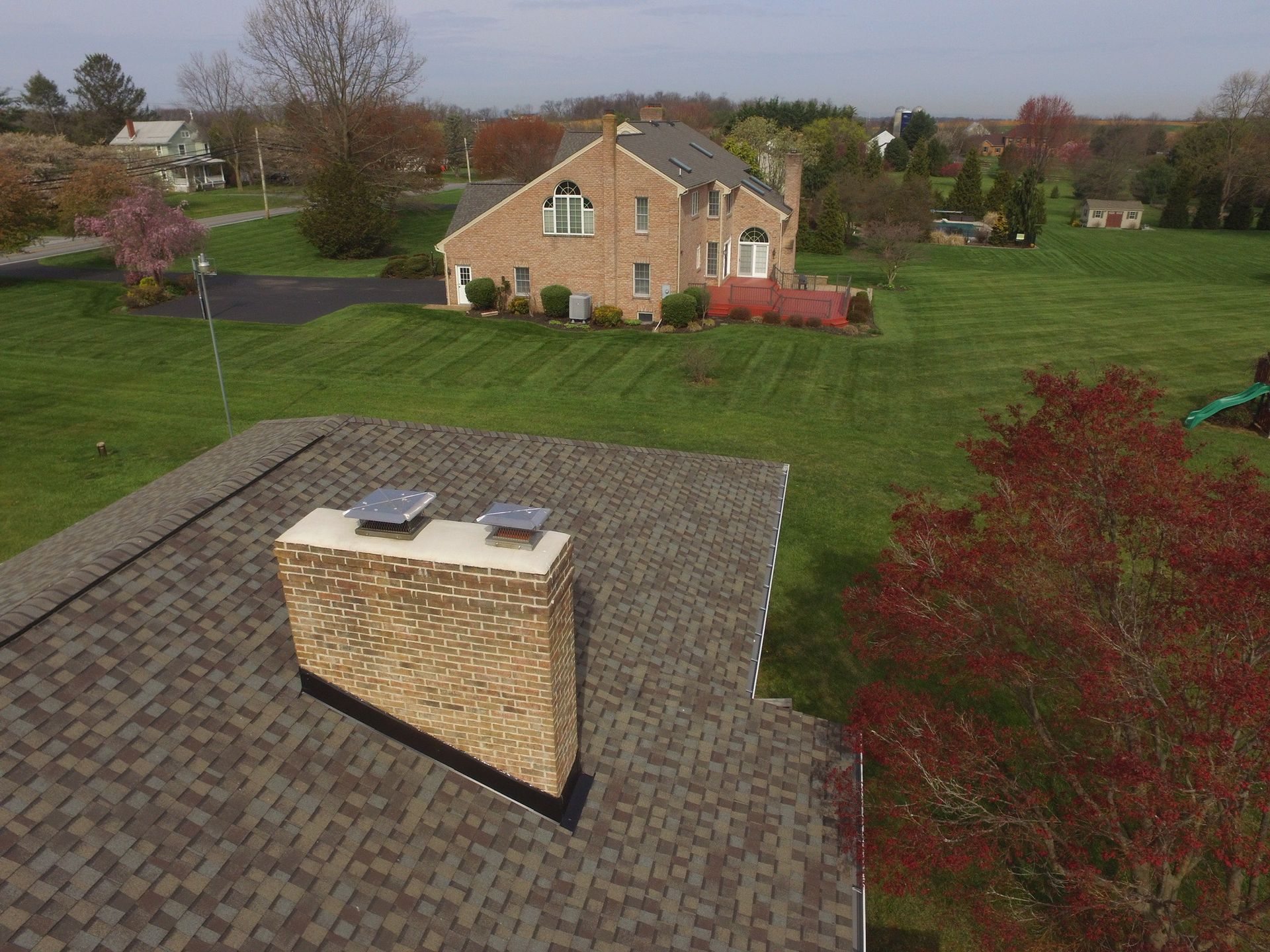 House with a Chimney on the Roof - Williamsport, MD - Poffenberger Roofing
